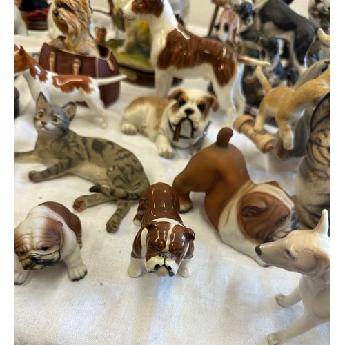 280 - Large selection of animal figures includes bull dogs, English Bull Terrior, cats, rocking horse by m... 