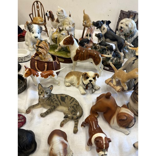 280 - Large selection of animal figures includes bull dogs, English Bull Terrior, cats, rocking horse by m... 