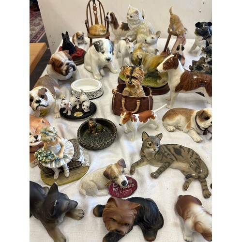 280 - Large selection of animal figures includes bull dogs, English Bull Terrior, cats, rocking horse by m... 