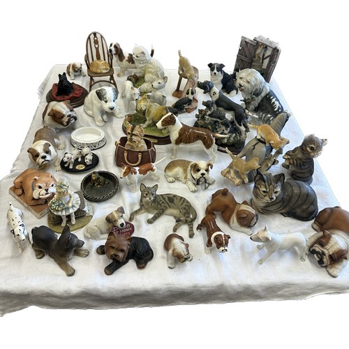 280 - Large selection of animal figures includes bull dogs, English Bull Terrior, cats, rocking horse by m... 