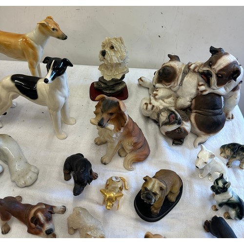 272 - Large selection of animal figures includes  Tigers, Corgi, French bulldog, dachshund et.