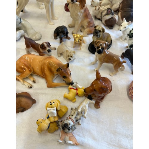 272 - Large selection of animal figures includes  Tigers, Corgi, French bulldog, dachshund et.