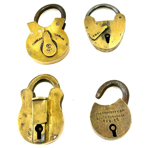 470 - Four antique brass padlocks