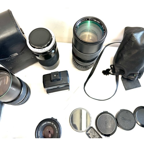 209 - Box of vintage camera equipment to include lenses, makers canon, Mitsuki, Rolleinar etc