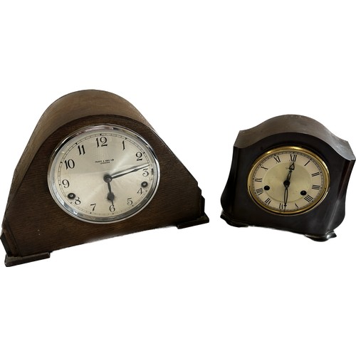 109 - 2 Mantel clocks includes smith and Pearce and sons, besel is missing from he smiths, both untested