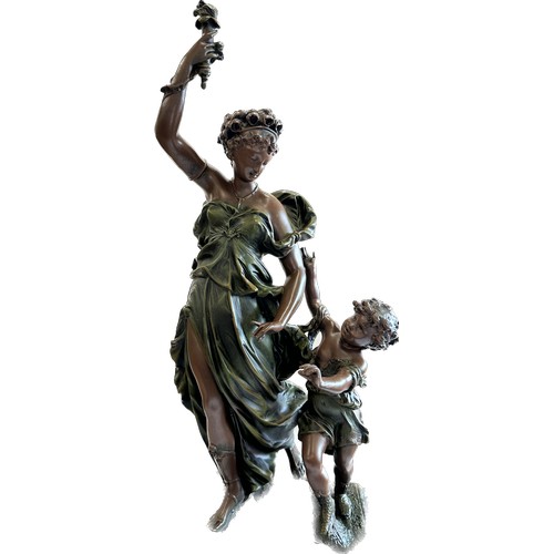 223 - Large resin decorative center piece of a mother and child, height approximately 29 inches