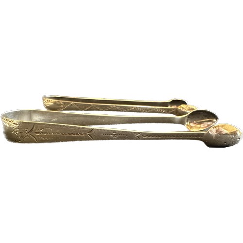 452 - Pair of Georgian sterling silver bright cut sugar tongs gross weight 50 grams