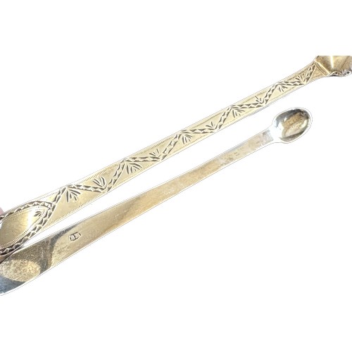 452 - Pair of Georgian sterling silver bright cut sugar tongs gross weight 50 grams