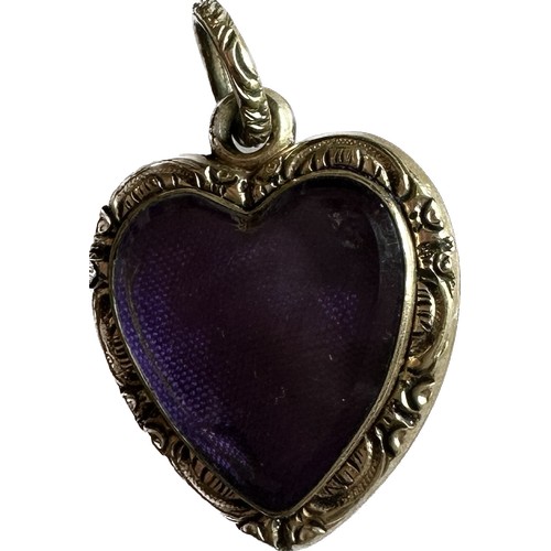 464 - Vintage heart shaped yellow metal locket