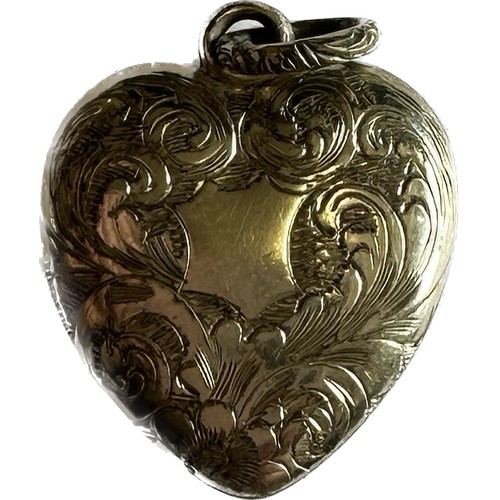 464 - Vintage heart shaped yellow metal locket