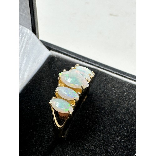 307 - 14ct gold opal five stone ring (3.2g)