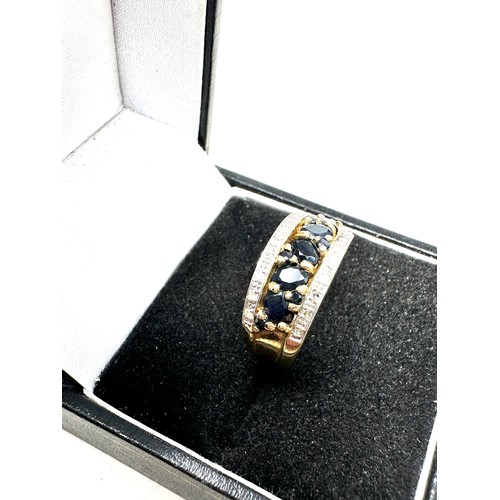 229 - 9ct gold diamond & sapphire dress ring (3.1g)