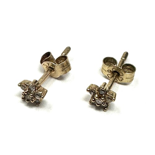 240 - 9ct gold diamond stud earrings (0.4g)