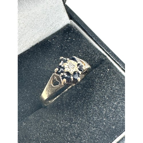 245 - 9ct gold diamond and sapphire cluster ring (2g)