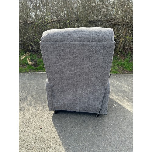 371 - Grey fabric electric reclining arm chair, good overall condition, approximate measurements: Height 4... 