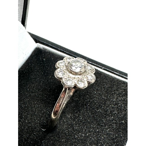 218 - 18ct white gold diamond halo ring (4g)