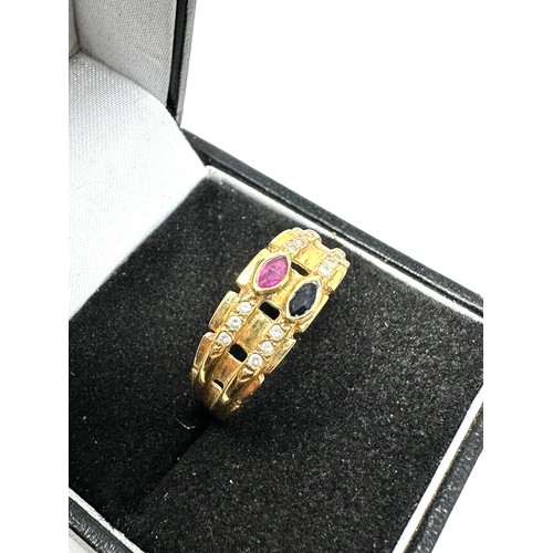 169 - 18ct gold diamond, ruby & sapphire dress ring (2.2g)