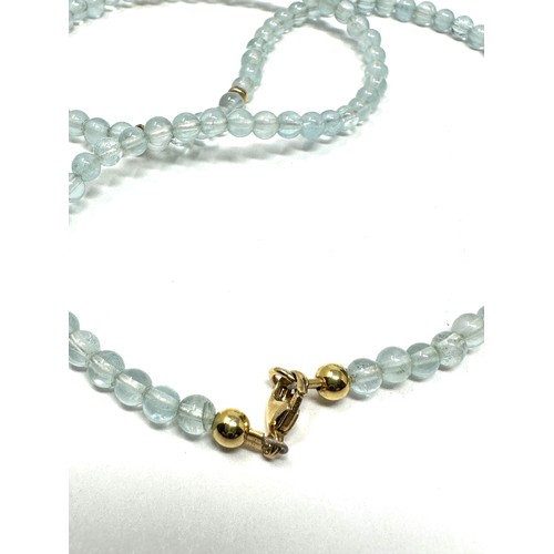 203 - 18ct gold clasp aquamarine beaded necklace with gold spacers (9.3g)