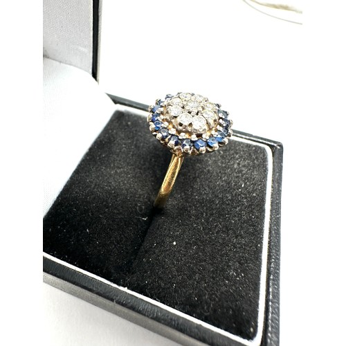 196 - 18ct gold diamond & sapphire halo ring (5.2g)