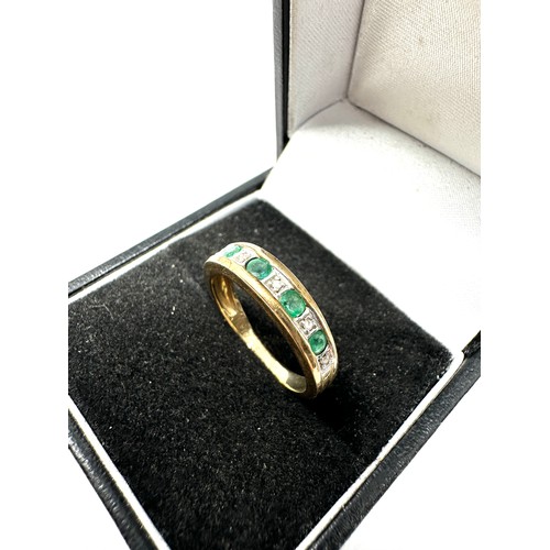 210 - 9ct gold diamond & emerald half eternity ring (2.2g)