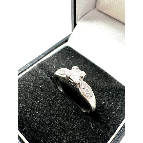 214 - 9ct white gold diamond solitaire ring with diamond set shank (2.3g)