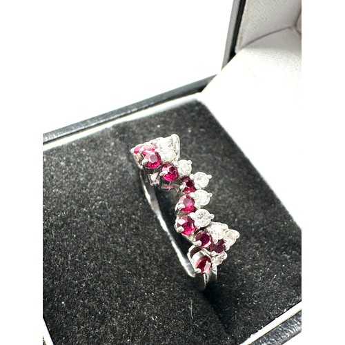 195 - 18ct white gold diamond & ruby dress ring (4.1g)