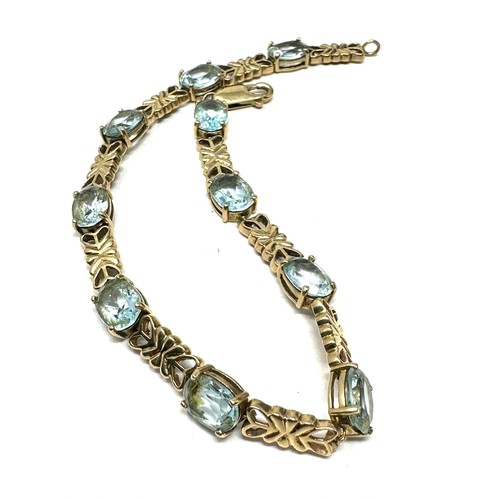 174 - 9ct gold topaz fancy link bracelet (11.4g)