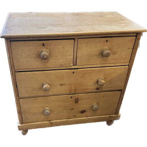 388 - 2 over 2 pine chest of drawers measures approximately 38 inches tall 37.5 inches wide 19.5 inches de... 