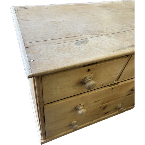 388 - 2 over 2 pine chest of drawers measures approximately 38 inches tall 37.5 inches wide 19.5 inches de... 