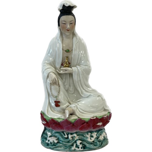 91 - Sitting Chinese Guanyin multi coloured goddess of Mercy, approximate height 10 inches, marks to base... 