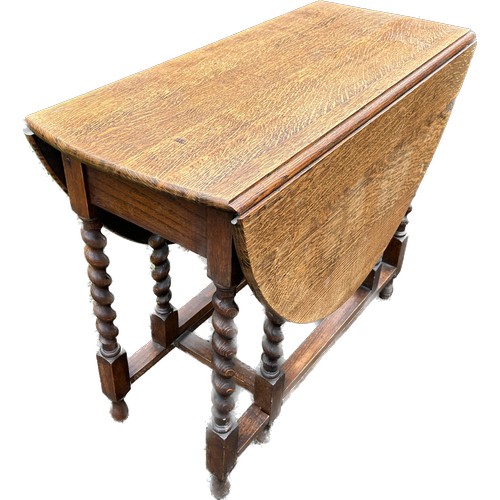 405 - Barley twist gate leg table measures approximately 29 inches tall 35.5 inches wide 50 inches depth (... 