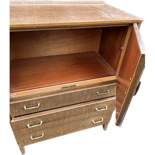 407 - 2 door 3 drawer oak tall boy measures approximately 41inches tall 30 inches wide 17. inches depth