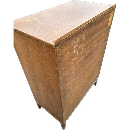 407 - 2 door 3 drawer oak tall boy measures approximately 41inches tall 30 inches wide 17. inches depth