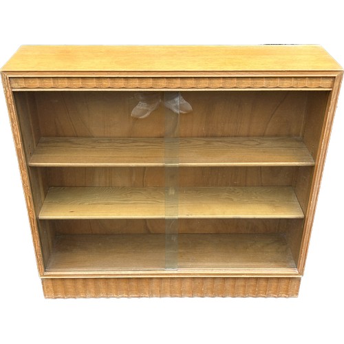 433 - Glass 2 door sliding bookcase 34 inches tall 36 inches wide 9 inches depth