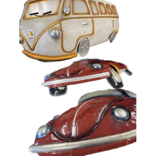 329 - 3 metal VW vehicle wall plaques, largest measures approximately Width 25 inches, Height 50 inches