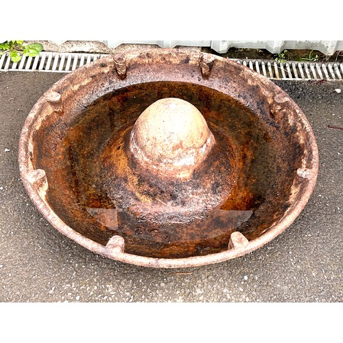 100S - Cast iron Mexican hat trough, approximate measurements 34 inches diameter, 10 inches tall