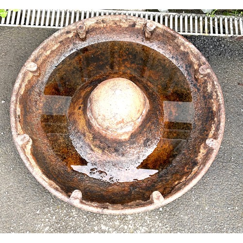 100S - Cast iron Mexican hat trough, approximate measurements 34 inches diameter, 10 inches tall