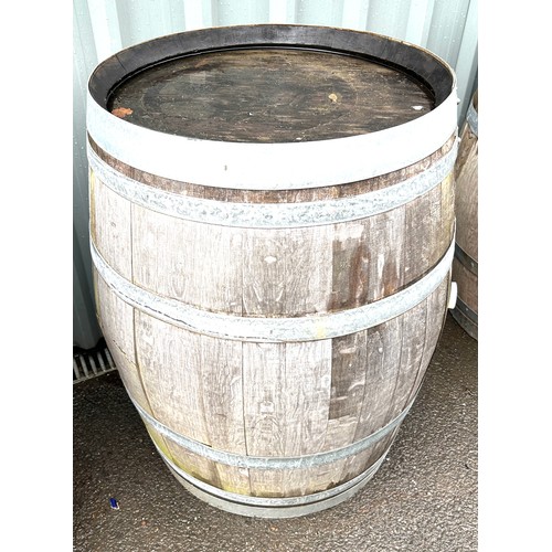 100N - Wooden and metal barrel measures approx 35 inches tall diameter 23 inches