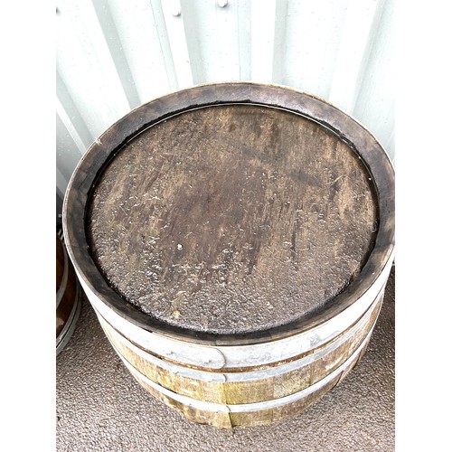 100N - Wooden and metal barrel measures approx 35 inches tall diameter 23 inches