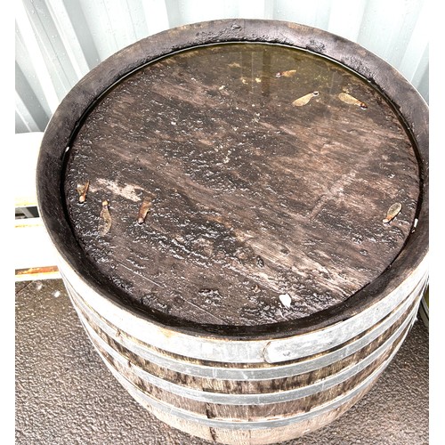 100Q - Wooden and metal barrel measures approx 35 inches tall diameter 23 inches