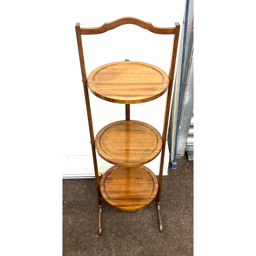 414 - Mahogany 3 tier folding cake stand, approximate height 34.5 inches