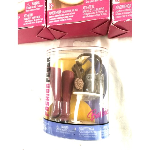 22 - Selection of 3 boxed barbies and accessories