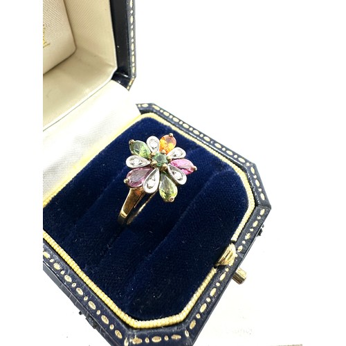 118 - 9ct gold diamond & vari-hue sapphire floral cluster ring (3.2g)