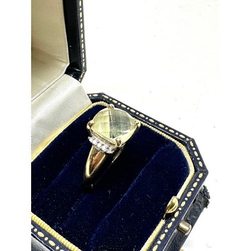 230 - 9ct gold diamond & prasiolite dress ring (3.1g)