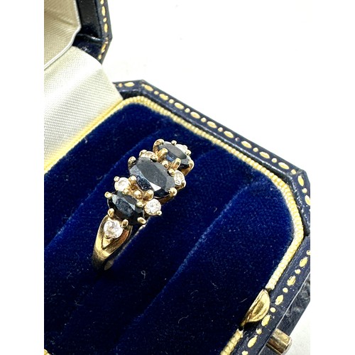 142 - 9ct gold vintage sapphire & white gemstone ring (2.3g)