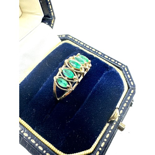 233 - 9ct gold emerald five stone ring (1.8g)