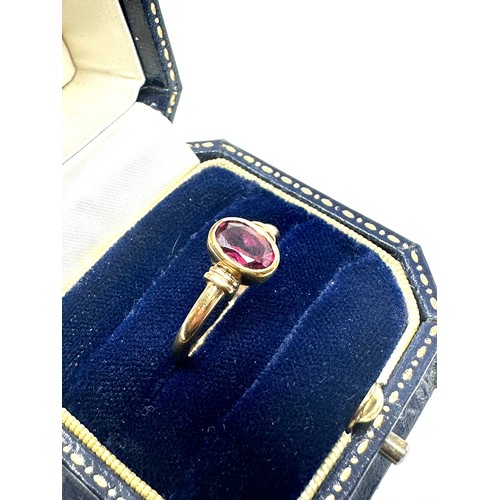 205 - 9ct gold garnet single stone ring (2.1g)