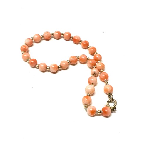 239 - 9ct gold coral bracelet (4.5g)