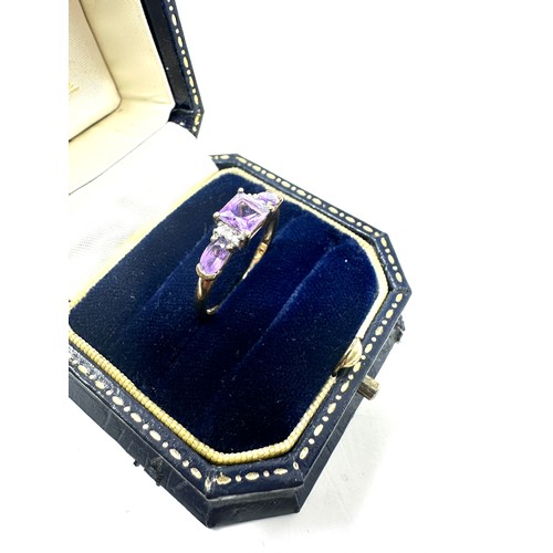 220 - 9ct gold diamond & amethyst dress ring (1.6g)