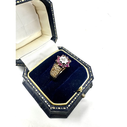 277 - 9ct gold diamond & ruby floral cluster ring (4g)